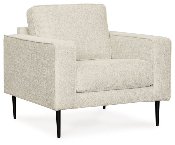 Simple comfort meets modern function in this chair. An apt addition to apartments and other small spaces, the slim-profiled piece welcomes you with its cozy character. A subtle chevron pattern aon the cushions refresh the classic neutral hue, elevating th
