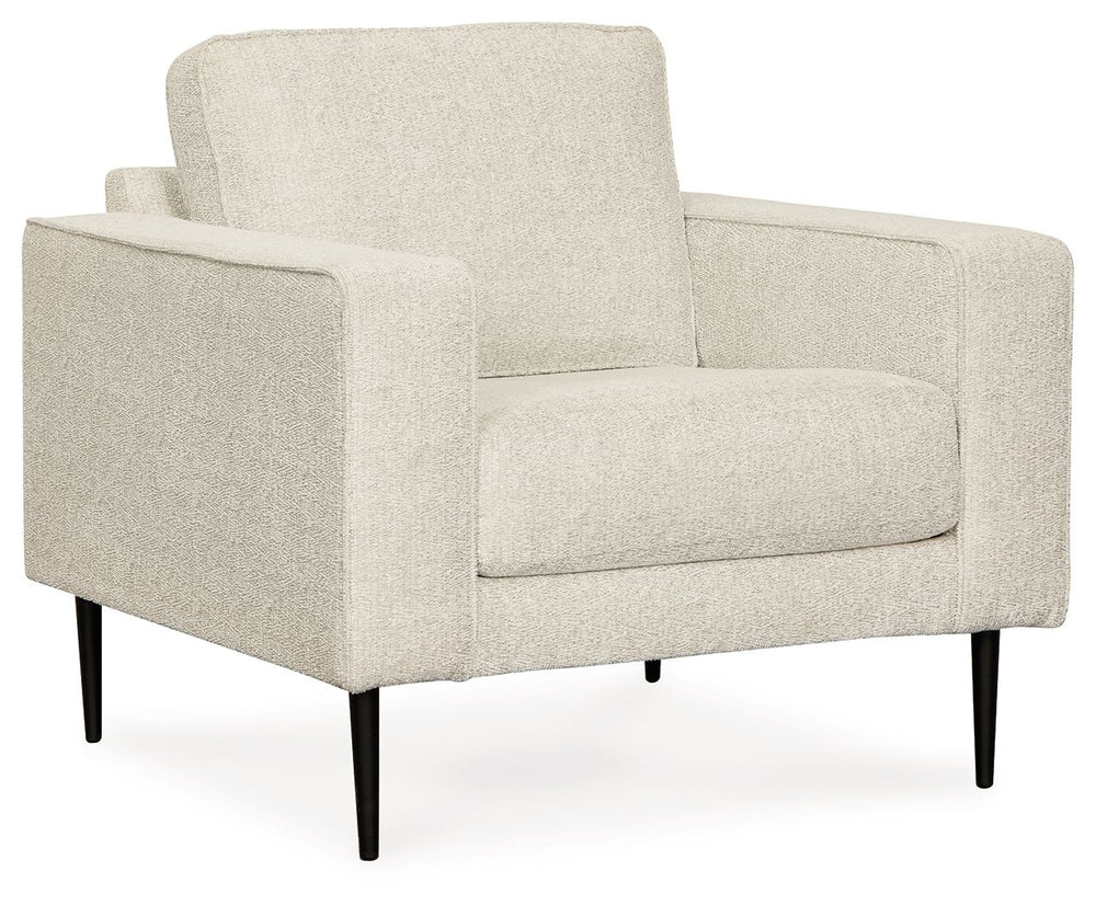 Simple comfort meets modern function in this living room set. An apt addition to apartments and other small spaces, the slim-profiled piece welcomes you with its cozy character. A subtle chevron pattern on the cushions refreshes the classic neutral hue, e