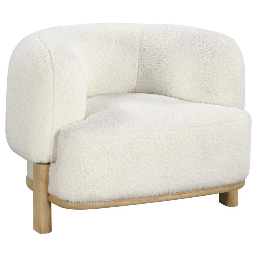 Build a refined, approachable living room aesthetic around this charming modern accent chair. It-'s a barrel back silhouette that impresses with strong, enduring lines that create a welcoming ambiance. Heavily textured upholstery adds neutral allure, perf