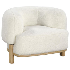Build a refined, approachable living room aesthetic around this charming modern accent chair. It-'s a barrel back silhouette that impresses with strong, enduring lines that create a welcoming ambiance. Heavily textured upholstery adds neutral allure, perf