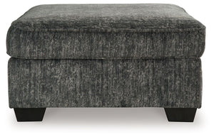  the plush upholstery and dark tri-block legs are a na