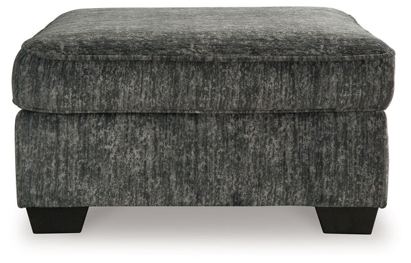  the plush upholstery and dark tri-block legs are a na