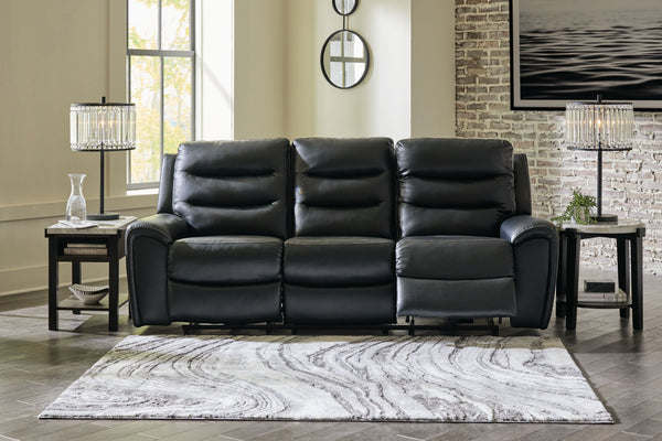  this power reclining sofa and loveseat has a sleek sensibility that seamlessly elevates your living room aesthetic. Explore endless possibilities for comfort with its one-touch power control