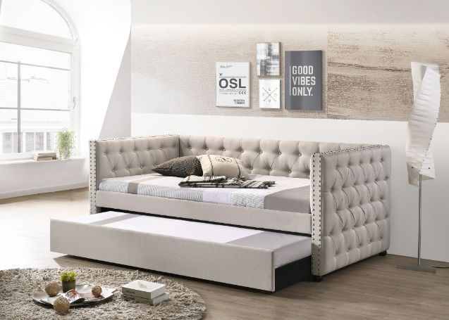 Maximize the space in your guest room with this Romona daybed & trundle. An excellent choice for any guest room that doubles as a study, or as extra sleeping space in a bedroom. Beautiful, timeless details such as button tufting and nail-head trim accents