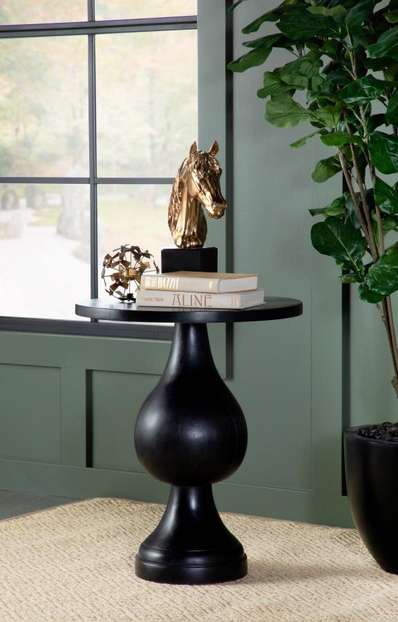  this modern side table offers a stylish blend of art and sophistication. A pedestal design doubles down on elegance and creates an eye-catching look. Infuse romantic charm to a living space or entryway with a table featu