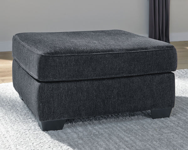  then this oversized accent ottoman is the answer. Its clean-lined profile is beautifully contemporary. Plush chenille fabric and plump cushioning make it so easy to comfortably kick up your heels. And the ottoman-'s richly neutra