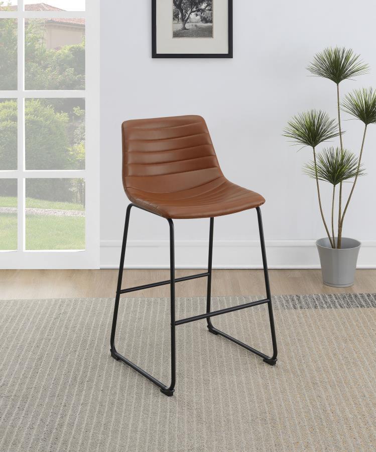 You-'ll love the upgraded ambiance of a set of two contemporary barstools in your kitchen or home lounge. Each counter stool shows off faux leather upholstery over a bucket style seat for inviting comfort. Beautiful color is highlighted with channel tufti