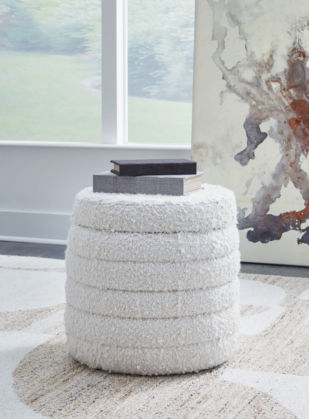Who says comfort and contemporary style can-'t go hand in hand? This ottoman with storage entices with an inviting softness. Storage beneath the top merges forward-thinking function with a modern vibe. What a great place to kick back and unwind.<br><br><b