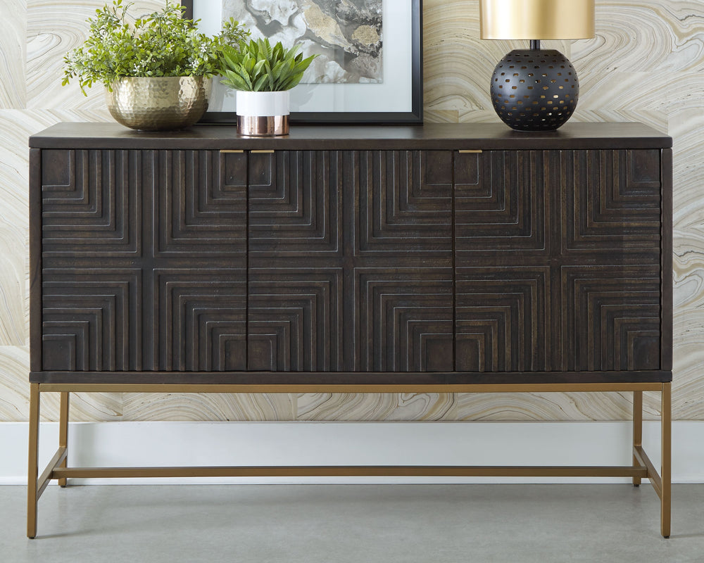 This accent cabinet is a versatile stunner with 3 geometric patterned door fronts in warm dark brown accented with goldtone finish metal hardware. Standing on a goldtone metal open frame base, the three-door console is aesthetically contemporary and sophi