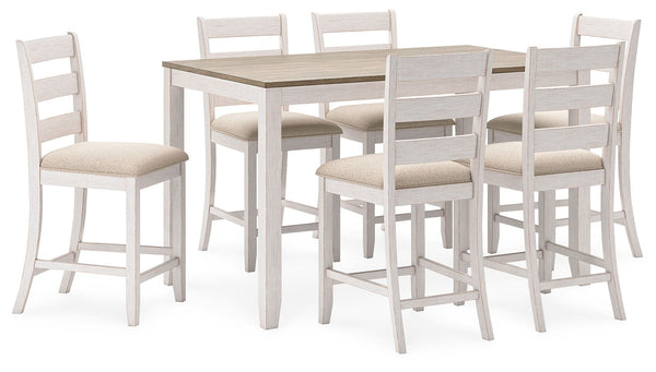 Set the scene for coastal chic or modern farmhouse living with this counter height dining set. The clean-lined, simply striking table doubles the charm with a brown plank effect top, paired with a grayish white base with a rub through effect for timeworn 