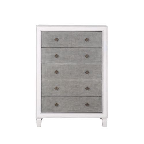 The Katia collection is perfect for creating a modern rustic or farmhouse aesthetic. Merging old and new design features and finishes. The bed features a channel-tufted headboard and footboard in gray linen that pops against the white frame. The case good