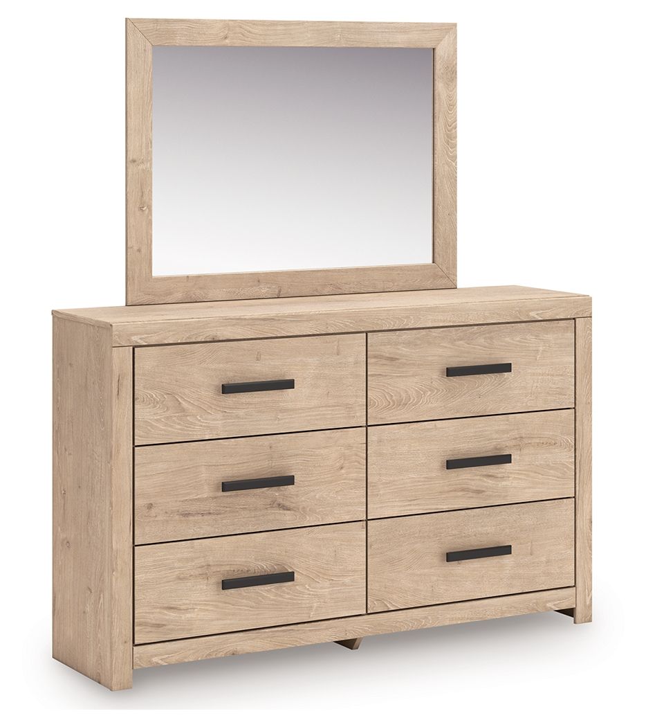 This dresser with mirror brings a touch of modern farmhouse charm to your home. Its light oak finish and clean lines have a fresh, airy feel, effortlessly creating an inviting atmosphere for a restful nightâ€™s sleep. Six spacious drawers with large black