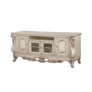  decorated with raised and oversized scrolled moldings in an antique champagne finish. This sophisticated l