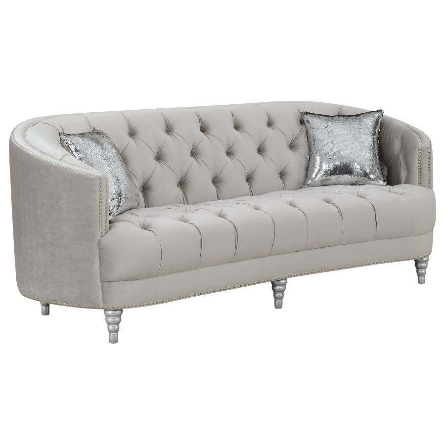 This stationary sofa is as stylish as it is functional. It features an appealing button-tufted design that imparts elegance. Seat back leads to a wraparound armrest that surrounds you in comfort. Extra thick cushions ensure hours of relaxed contentment. I