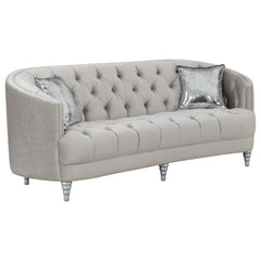 This stationary sofa is as stylish as it is functional. It features an appealing button-tufted design that imparts elegance. Seat back leads to a wraparound armrest that surrounds you in comfort. Extra thick cushions ensure hours of relaxed contentment. I