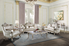 The Monique 3 Piece Royal Classic Living Room Set, featuring a sofa, loveseat, and chair in a luxurious champagne finish, is a testament to heirloom-quality craftsmanship and timeless elegance. Expertly constructed from premium pine solids and adorned wit
