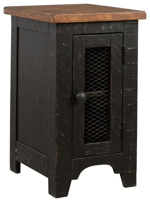 To those with an eye for the best in rustic farmhouse living, this two-tone chairside end table doubles up on charm. Designer touches include plank-effect styling, distress marks and a wire mesh door front for added character.<br><br><b>Additional Dimensi