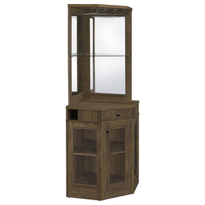 Place this corner bar cabinet in a modern farmhouse home to lend a charming country style. Constructed of durable, high pressure engineered veneer laminate, this cabinet comes in a rustic oak finish and features a mirrored back panel. Store your finest li