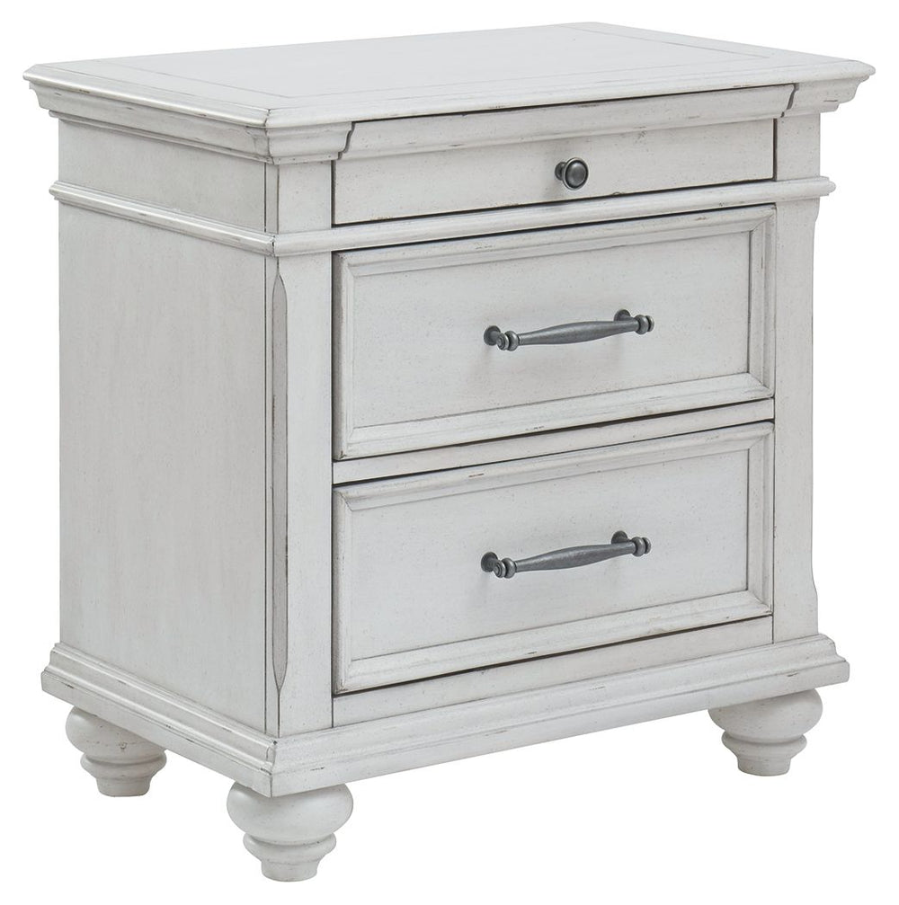 Give your retreat vintage charm and valuable bedside storage with this nightstand. In a beautifully distressed whitewash finish, two drawers and a smaller top accessory drawer will help you keep bedtime essentials nearby in casual style. Generously scaled