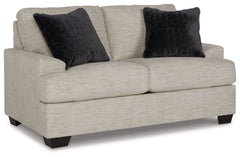 Laid-back luxury meets neutral practicality in this loveseat. Taking its cues from contemporary design, the clean-lined piece is outfitted with angular arms for a layer of geometric expression. Softly upholstered, sizable cushions keep you comfortable, wh