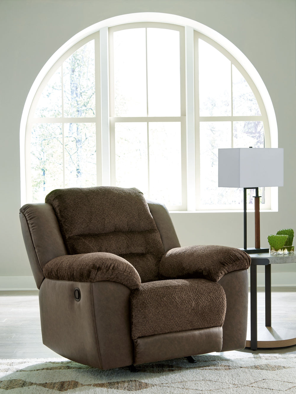 This recliner features soft-to-the-touch upholstery along with a dramatic style that steals attention. Featuring effortless reclining, it offers easy comfort for relaxation. This chair is in a league of its own. All that-'s missing is you.<br><br><b>Addit