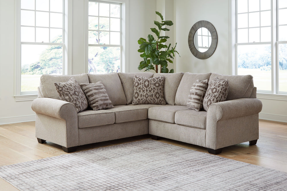 Whether your vision is traditional or cozy farmhouse, this sectional has the corner on style. Merging ultimate comfort with striking good looks, this chic seating includes coordinating accent pillows for that much more feel-good allure.<br/><br/><b>Produc