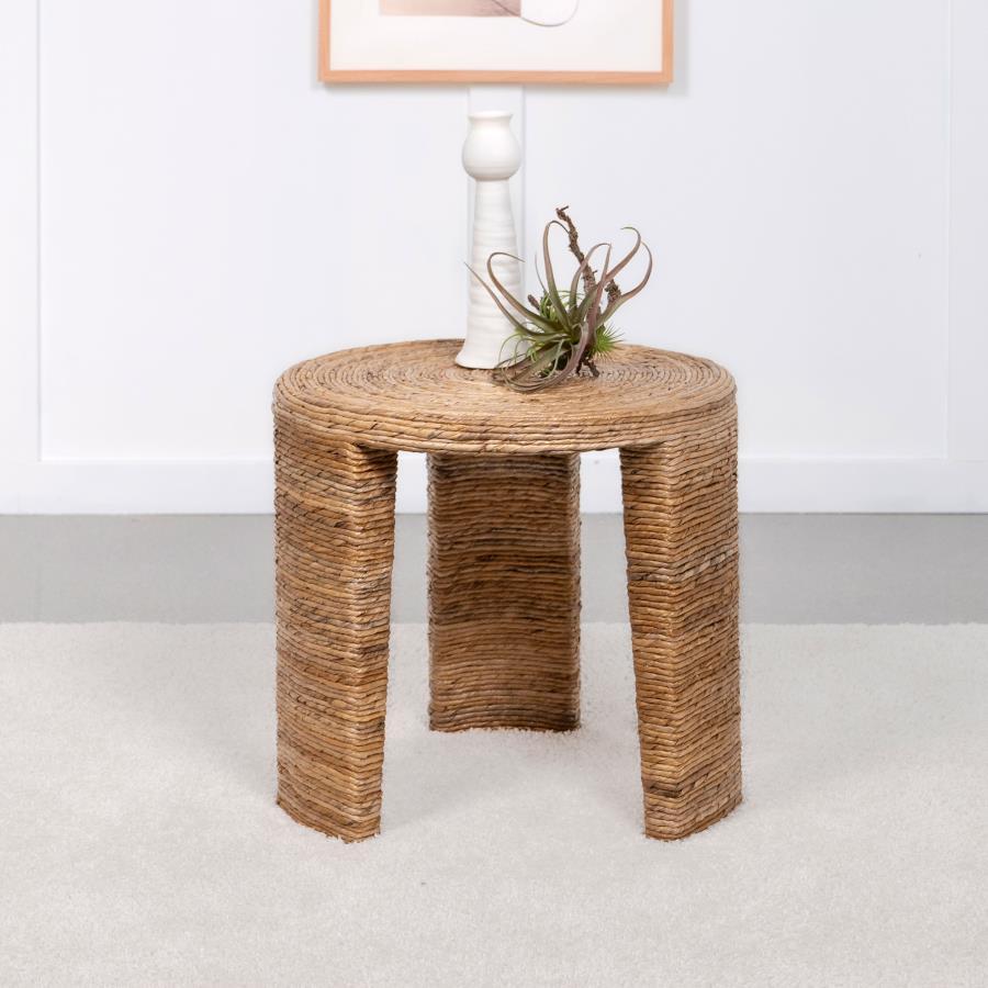 Soothing island vibes bring a relaxed coastal feel to your living space with this round end table, ideal for beach cottages or urban lofts alike. Woven rattan and banana leaf over a mahogany and plywood frame offer tropical texture and lasting durability.