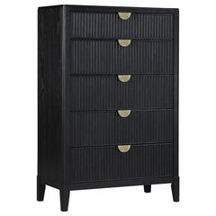 Add abundant clothing and accessory storage in a stylish bedroom with this modern five-drawer chest. Its compact profile fits virtually anywhere, while a chic look is created with fluted drawer fronts that add impressive dimensionality. A black finish imp