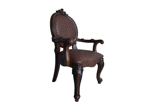 Irresistibly inviting, the Versailles collection displays the unrivaled beauty of the traditional dining. The dining table reflects highly decorative base with oversized scrolled feet, and the upholstered and tapestried chairs with deep button tufted and 