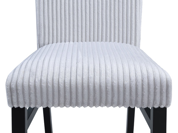  combining sleek design with timeless sophistication. The centerpiece is a striking glass-top table