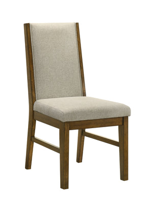 Transform your dining space into a haven of warmth and style with this stunning ensemble, perfect for both casual and formal settings. The tailored chairs and tufted bench are upholstered in a soft neutral fabric, providing luxurious comfort and a modern 