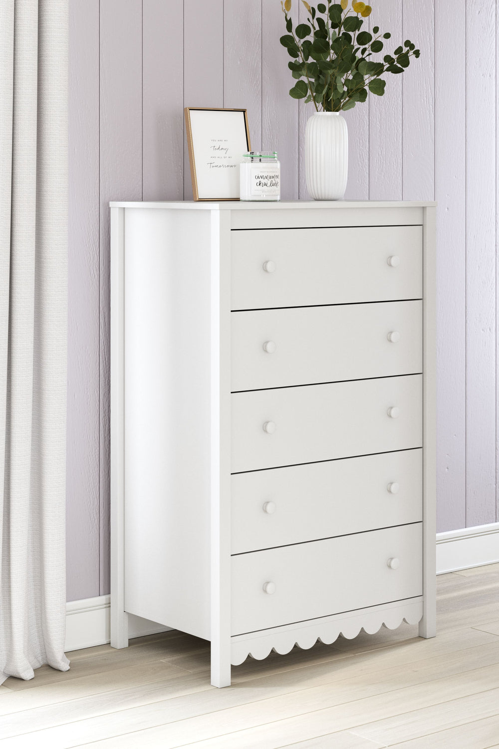 Thanks to its playful scalloped design, this chest of drawers is the perfect fit for cottage or coastal farmhouse interiors. The matte white finish serves as the perfect backdrop to showcase your personal taste and creativity. And its spacious drawers let