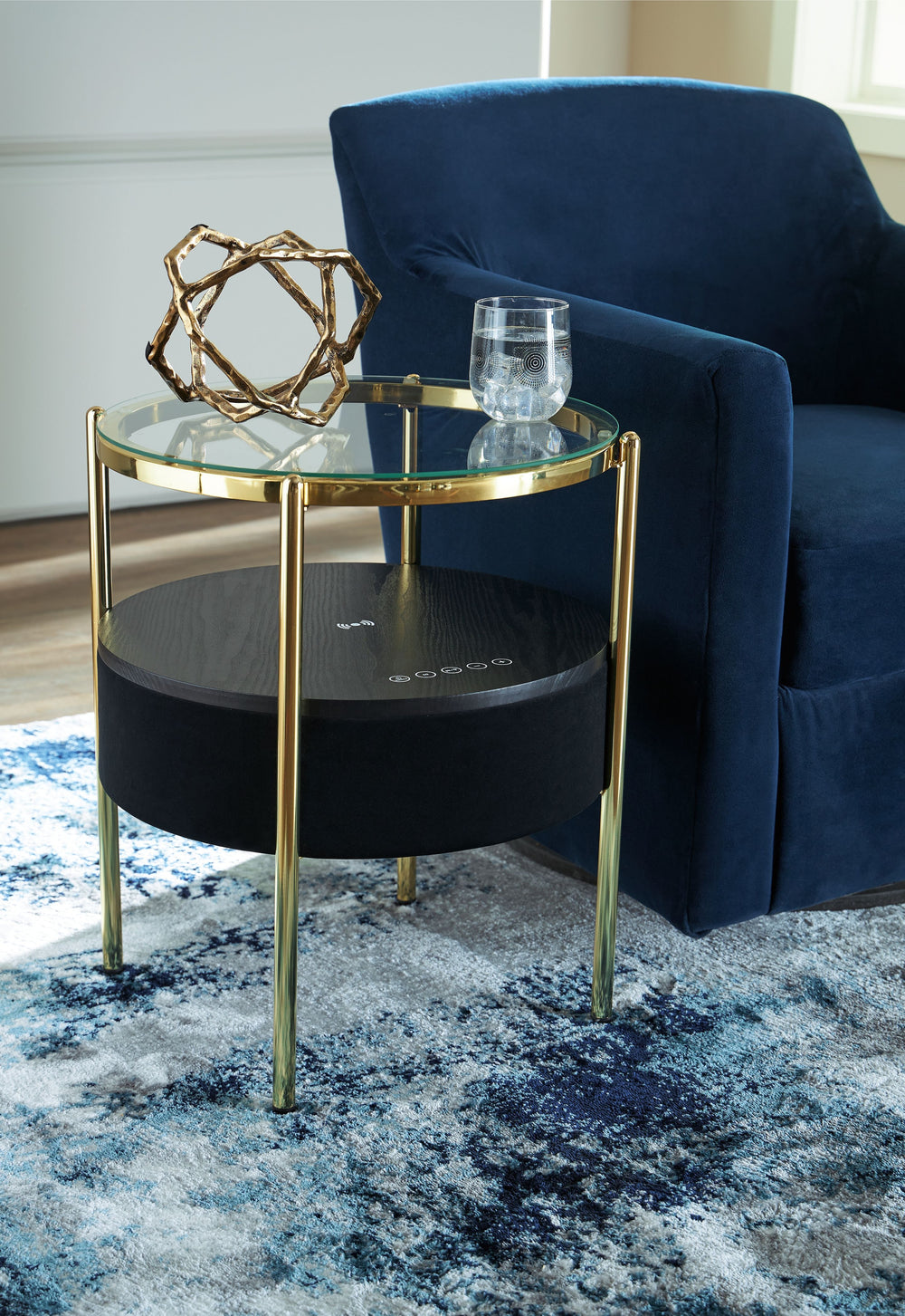Discover the perfect combination of contemporary style and space-saving functionality. This accent table is designed with an integrated speaker (complete with wireless charging and touch-button controls), allowing you to effortlessly stream your favorite 