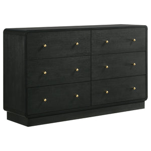 Complement a stylish bedroom with the abundant storage featured in a modern six-drawer dresser. Delivering a sophisticated presentation, it boasts a black finish over melamine surfaces that resist damage to remain looking their best. Ball knobs complement
