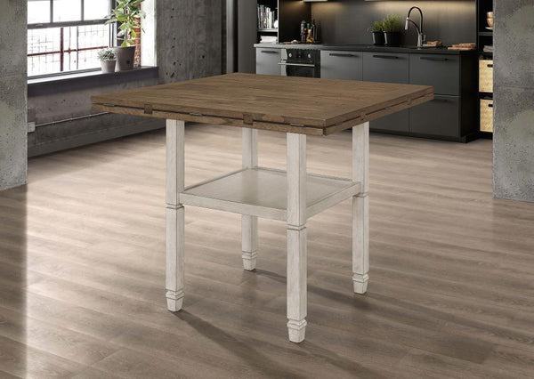  the square tabletop features four drop down leaves to convert it to a round shape. An open shelf is built into t