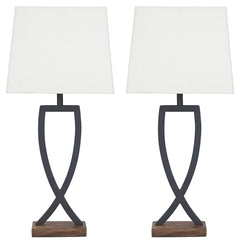 This table lamp is an enticing merge of mixed materials. Textured black finished metal stands poised atop a block of warm brown wood. Open design is right at home among casual decor.<br><br><b>Additional Dimensions</b><br><ul><li>Shade: 0-"</li><li>Cord l