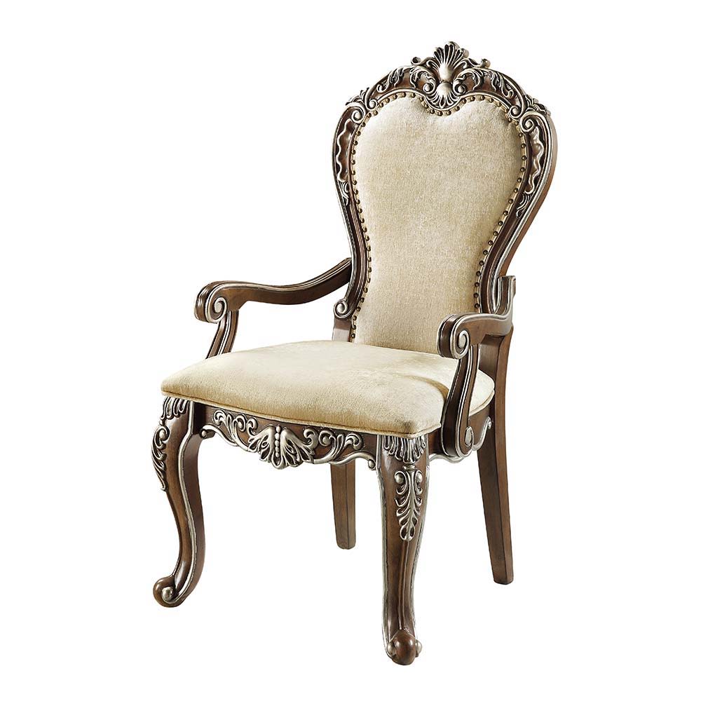 The Latisha armchairs bring comfort and elegant traditional style into your dining room. With plush seat cushions and padded backrests, dinner parties will surely last for hours. Against the antique oak, the floral moldings are highlighted with silver han
