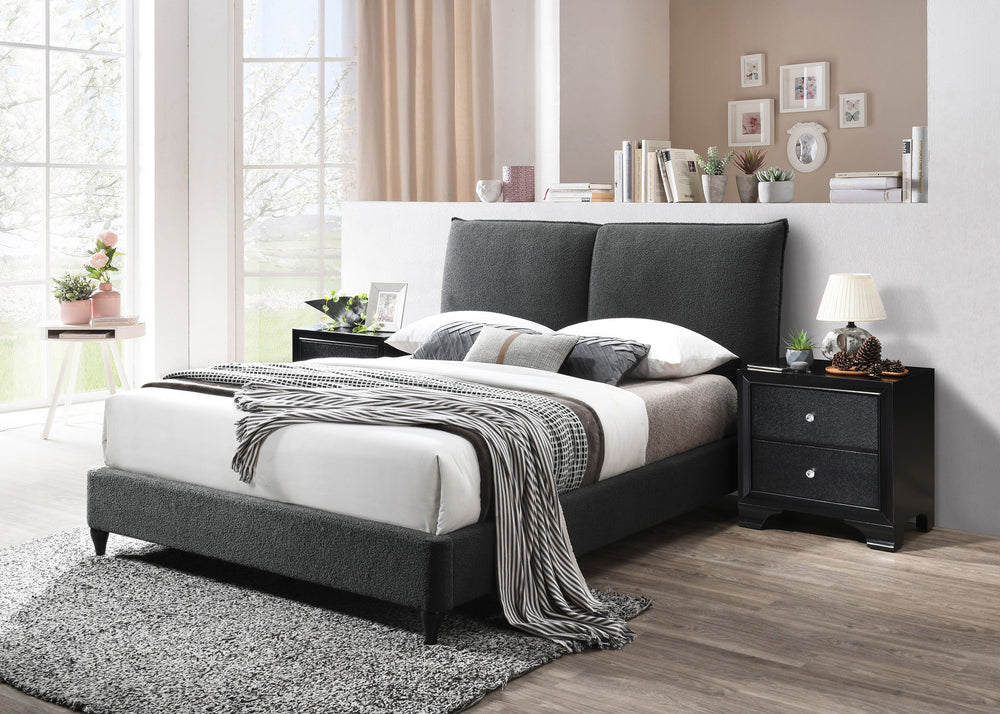 This lush contemporary bed frame is the perfect place to end your day. On trend boucle upholstery is stylish and timeless. Optional decking boards let you decide whether or not to use a box spring.<h4><b>Jenn - King Headboard And Footboard - Charcoal</b><