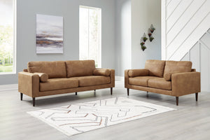 Small-scale style, tailored to perfection. This set echoes retro aesthetics with warm caramel faux leather, while its ultra-linear silhouette incorporates a contemporary edge. Versatile in form and function, the seat suits styles from modern boho to trans