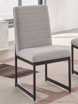  this upholstered dining chair takes a relaxed approach to refinement. The mixed-material design brings a trendy urban-chic feel to dinner time. And with a cushioned seat upholstered in a light beige fabric