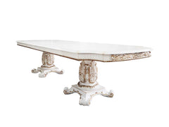 Commanding attention in any space, the impressive design of the Vendom double pedestal dining table will impress everyone. Adorned with classic elements including scrolls, curved shapes, and leaf molding accents to create an old-world charm. The antique p