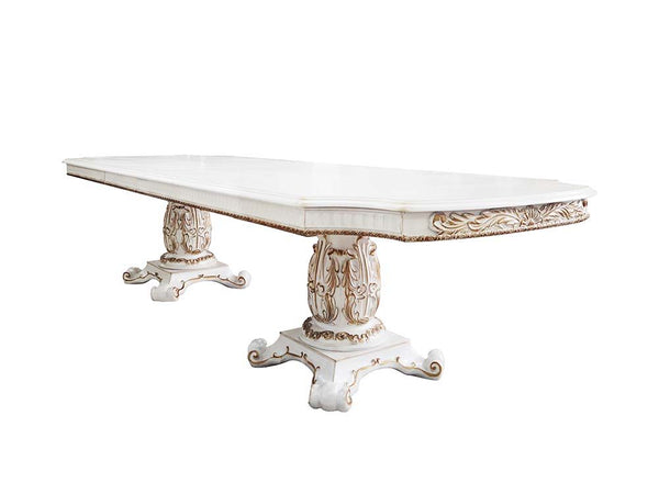 Commanding attention in any space, the impressive design of the Vendom double pedestal dining table will impress everyone. Adorned with classic elements including scrolls, curved shapes, and leaf molding accents to create an old-world charm. The antique p