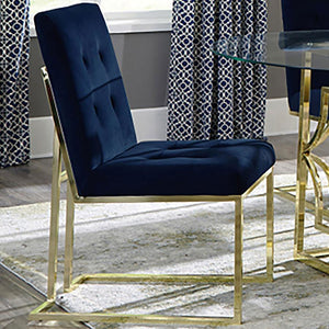  sleek and metallic gold legs create an open feel. Plush blue cushions fill the seat and back