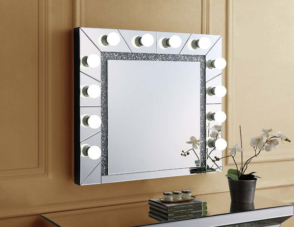 Always stand out from the crowd and always look your best, the Noralie Hollywood mirror. Sitting in front of this mirror will motivate you to try new looks and techniques with your makeup application. The gleaming faux diamond trim glimmers when the bulbs