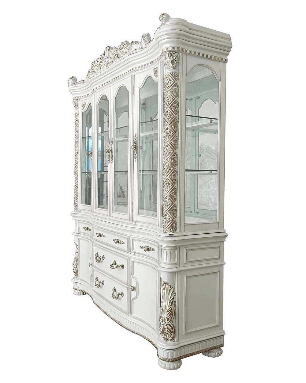 Commanding attention in any space, the impressive design of the Vendom double pedestal dining table will impress everyone. Adorned with classic elements including scrolls, curved shapes, and leaf molding accents to create an old-world charm. The antique p