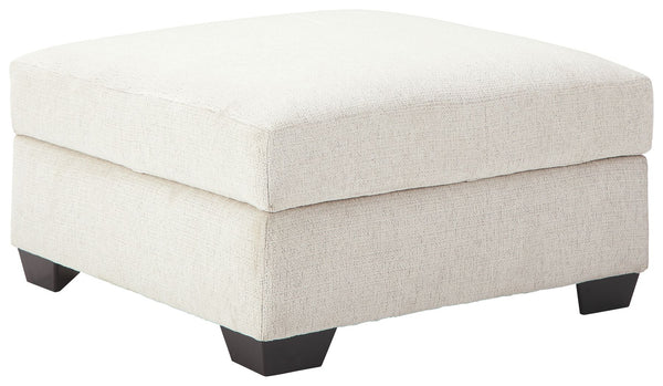 Let it snow. Doubling your pleasure with its combination of form and function, this storage ottoman in a snow-tone chenille fabric invites you to stretch your style in an easy-elegant way. Whether your aesthetic is urban hip or suburban chic, this posh ot