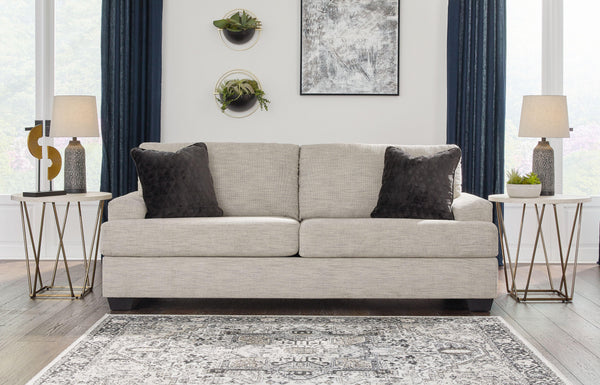  the clean-lined piece is outfitted with angular arms for a layer of geometric expression. Softly upholstered