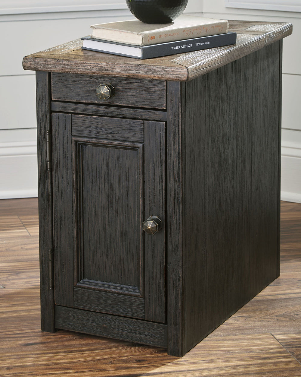 Shabby chic with a hint of down-home country, this chairside end table is all the talk of todayâ€™s design world. Wood grain shows through the weathered gray-brown top in all of its earthy pleasure. A pull-out tray with lovely traditional hardware has two