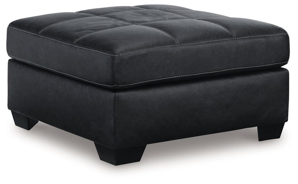Everyday comfort meets versatile style in this oversized ottoman. The handsome hue of the goes-with-anything faux leather takes away the stress of styling, expertly pairing with your existing aesthetic. From kicking back on the weekends to relaxing post-w