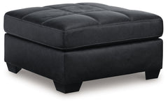 Everyday comfort meets versatile style in this oversized ottoman. The handsome hue of the goes-with-anything faux leather takes away the stress of styling, expertly pairing with your existing aesthetic. From kicking back on the weekends to relaxing post-w